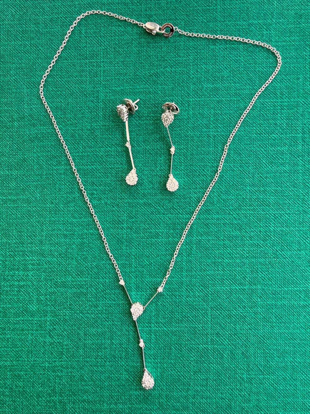 Damiani earrings in white gold and diamonds earrings and necklace.